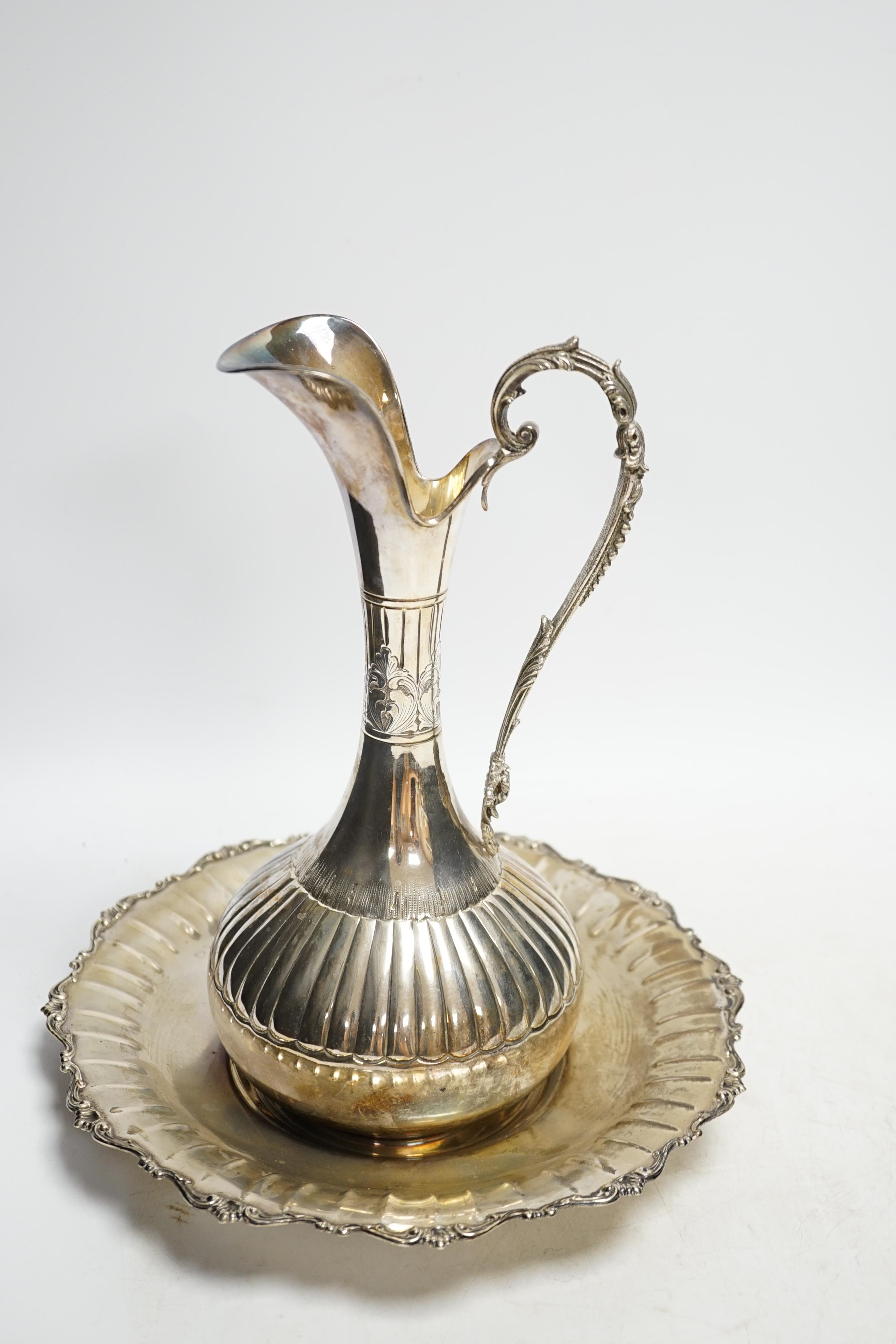 A modern Italian 800 standard white metal ewer, 27.5cm, together with a similar stand, 23.1oz. Condition - fair to good